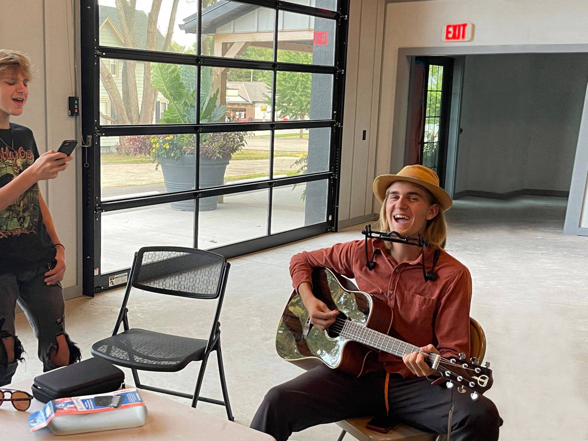 Ashton playing guitar