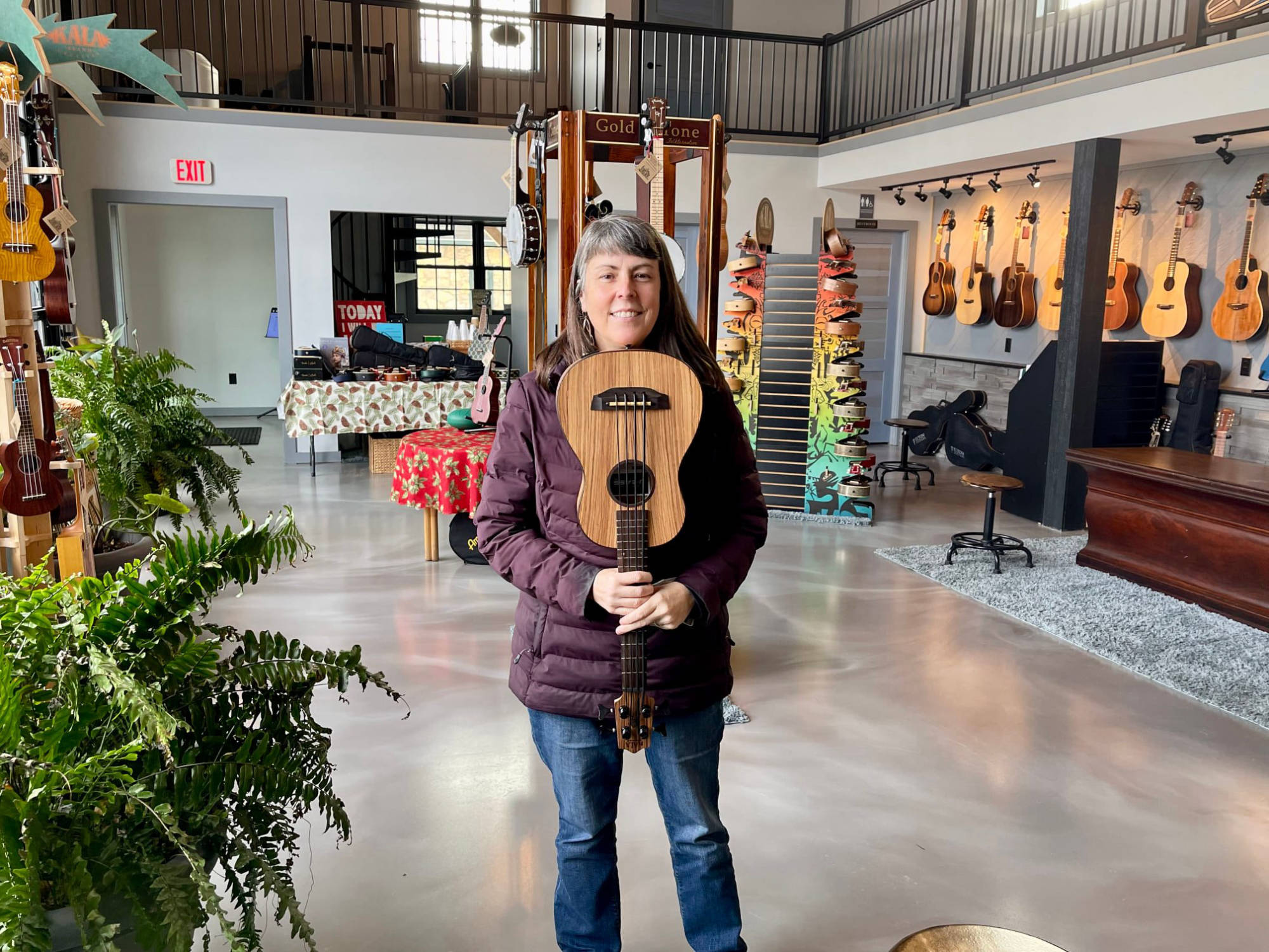 Friend with Kala bass ukulele