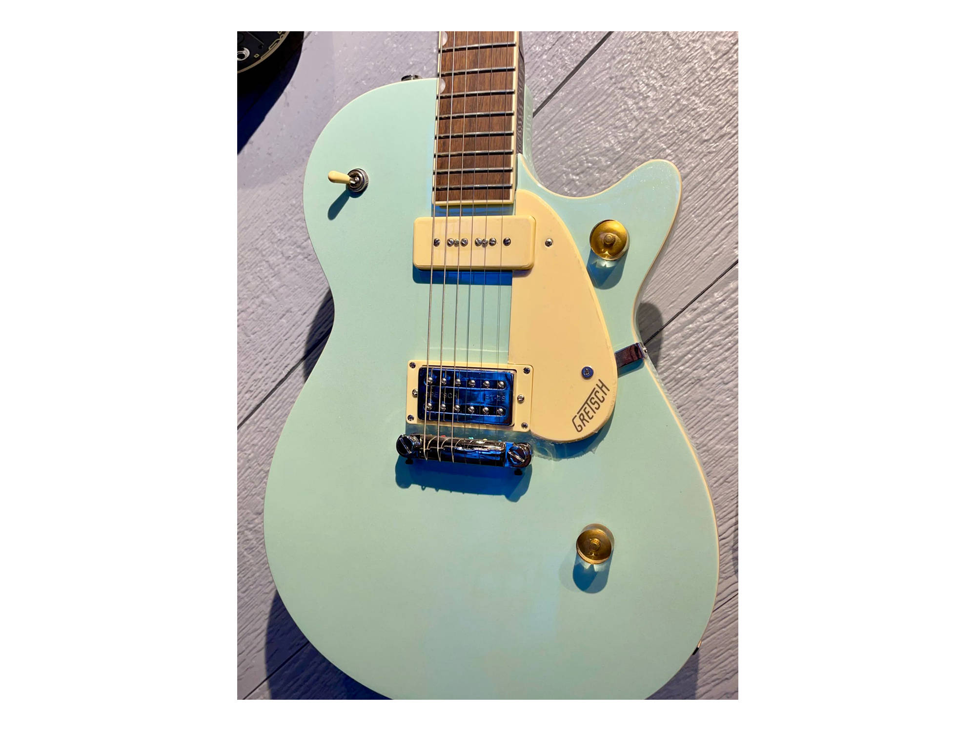 gretsch mint metallic guitar